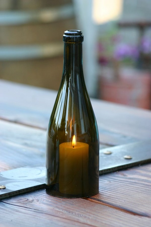 Portavelas con botella de vidrio