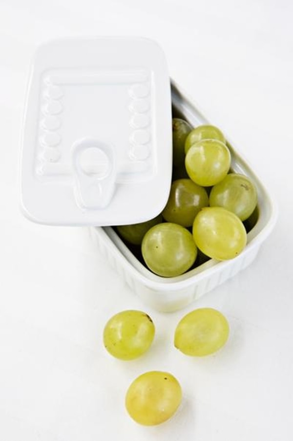 Presentación de las uvas en latas de conserva