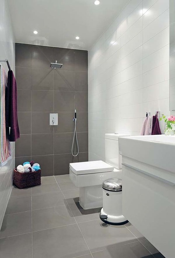 Continuidad suelo y pared en baño pequeño