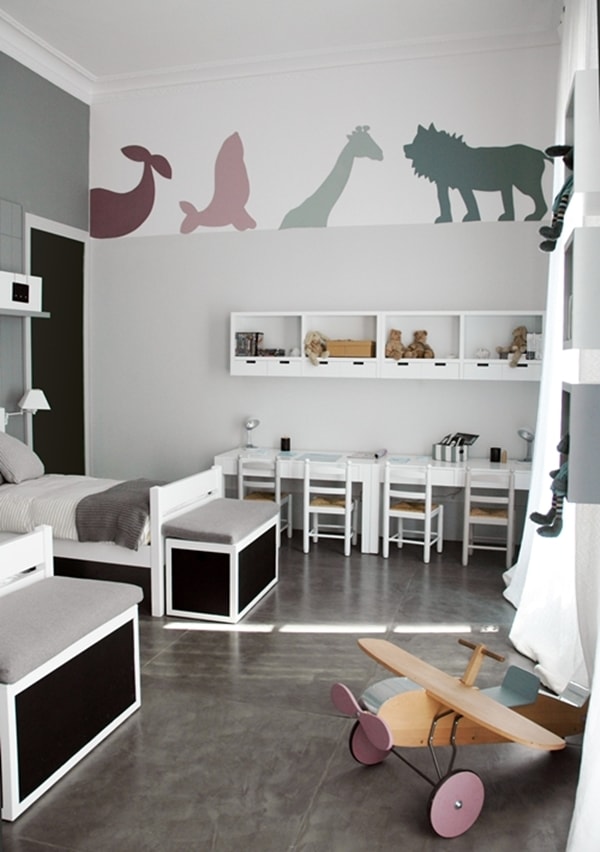 Dormitorio infantil unisex con vinilos de animales