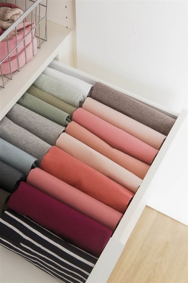 Doblado vertical para organizar armarios