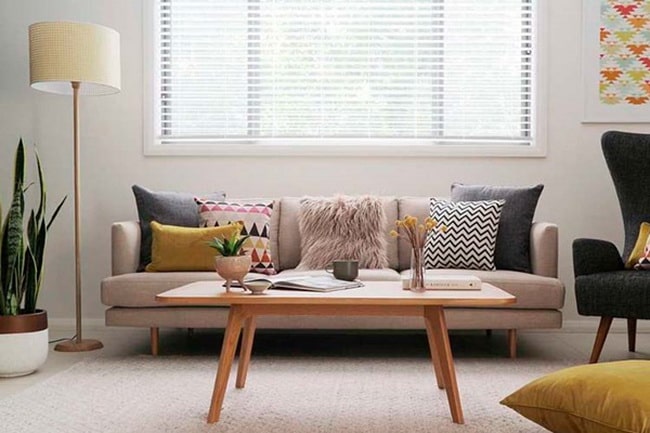 Decorar la sala con textiles