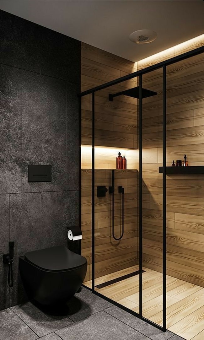 Baños con mucha madera y color negro