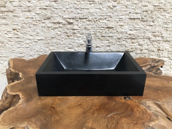 Lavabo de piedra en color negro