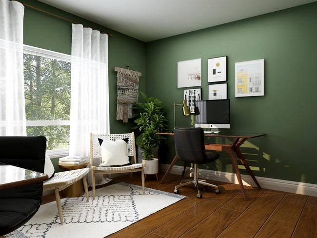 Despacho en casa con paredes verdes