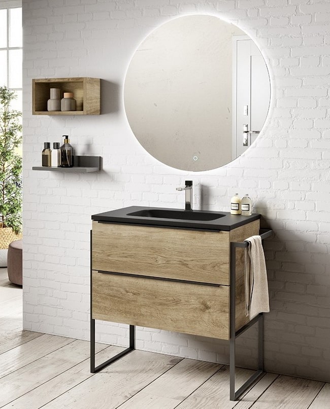 Baños minimalistas con espejos redondos