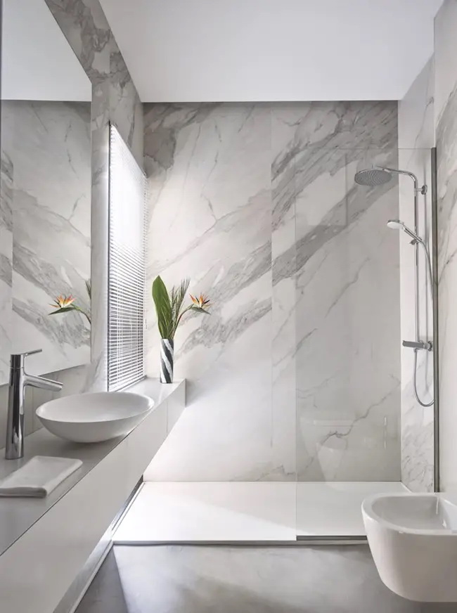 Efecto continuidad en paredes de baños